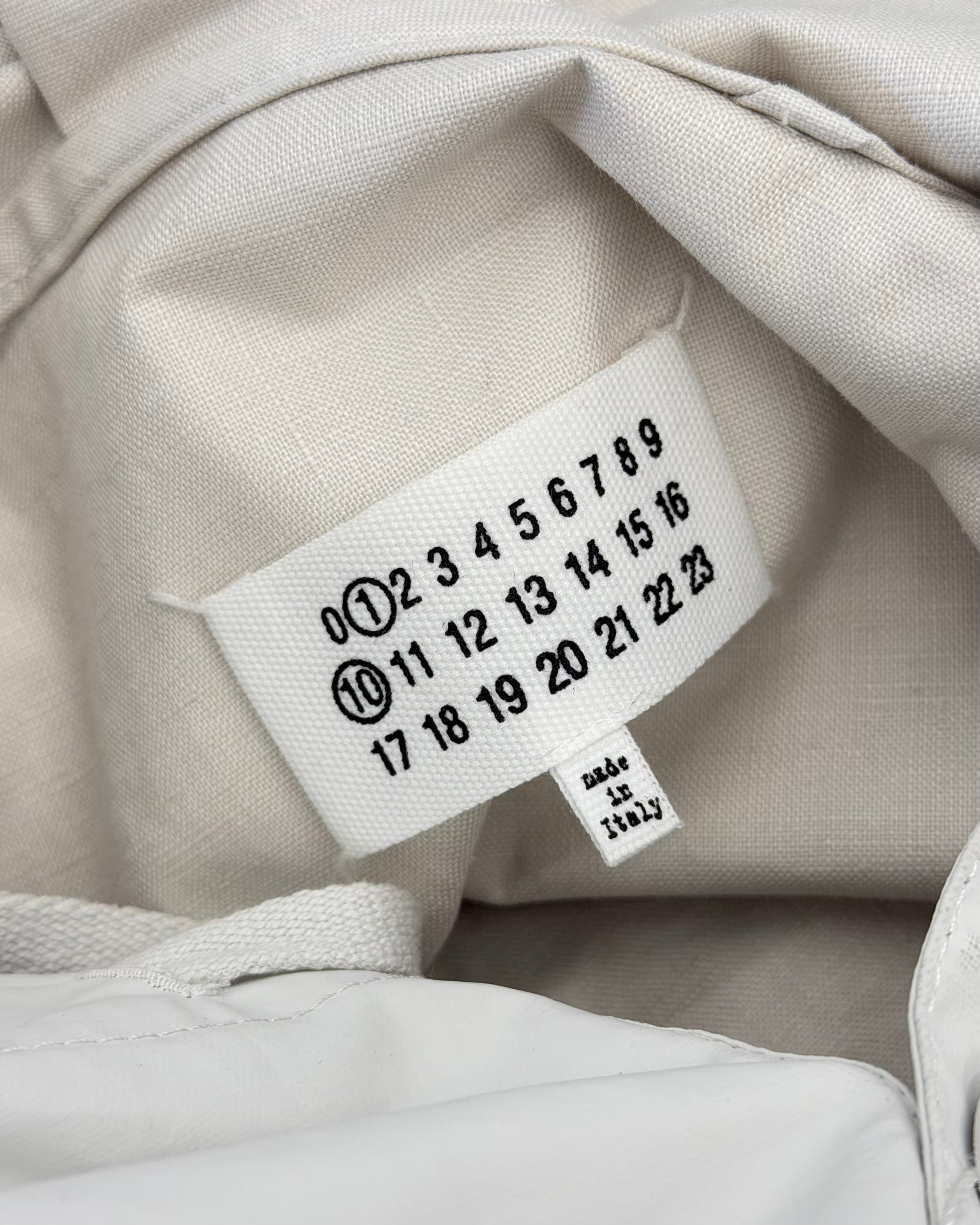 MAISON MARGIELA FW24 WAXED RUBBER HOODED WINDBREAKER