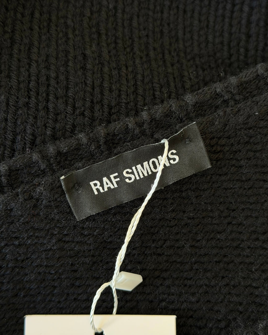 RAF SIMONS X SMILEY CROPPED SWEATER