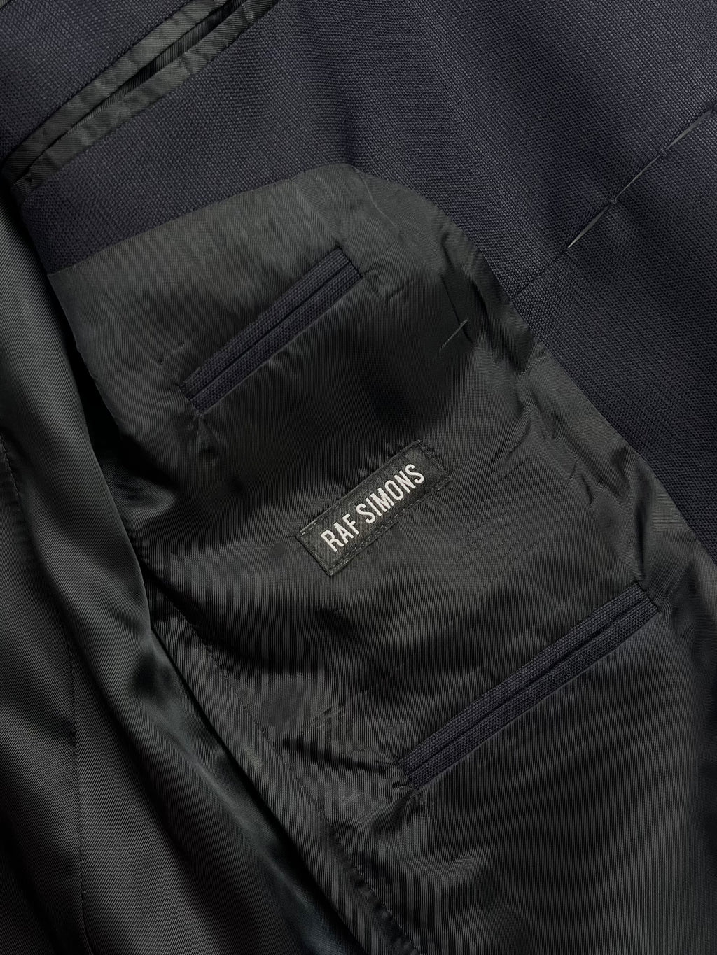 RAF SIMONS SS15 MULTIPLE BUTTON SLEEVELESS JACKET